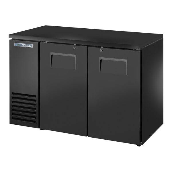 A black True back bar refrigerator with two solid doors open.