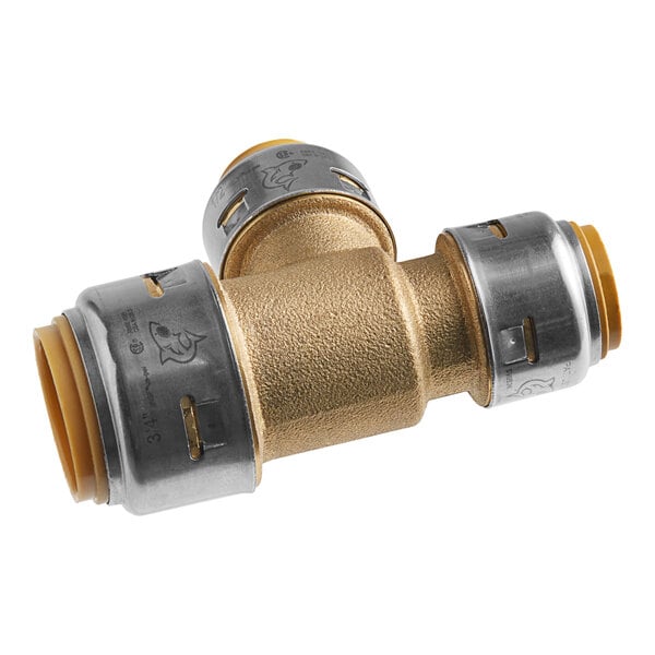 A SharkBite brass push-to-connect reducing tee with metal pipes attached.