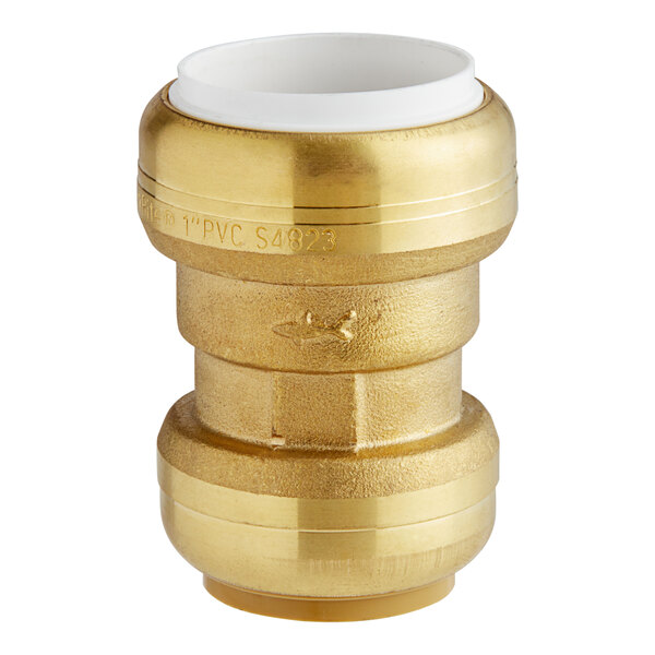 A SharkBite brass push-to-connect PVC transition coupling.