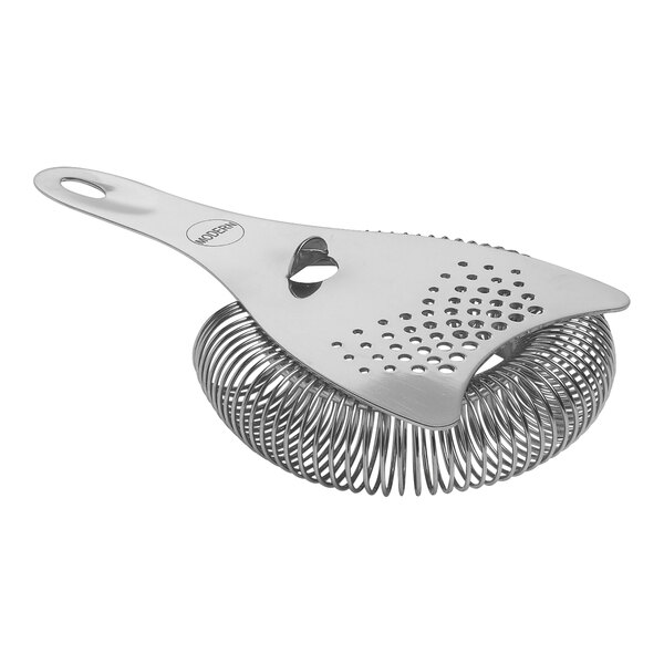 A close-up of a Modern Mixologist stainless steel Hawthorne Strainer with a handle and holes on it.