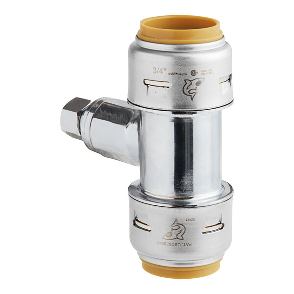 A SharkBite brass pipe connection with yellow accents and stainless steel.