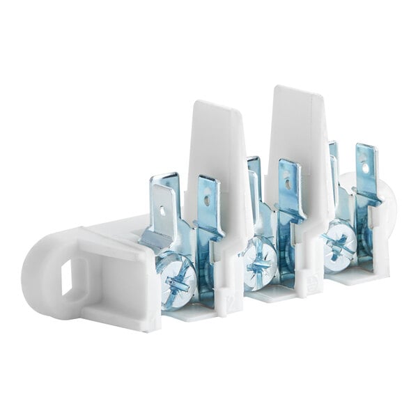 A white plastic Cooking Performance Group connector block with three blue screws.