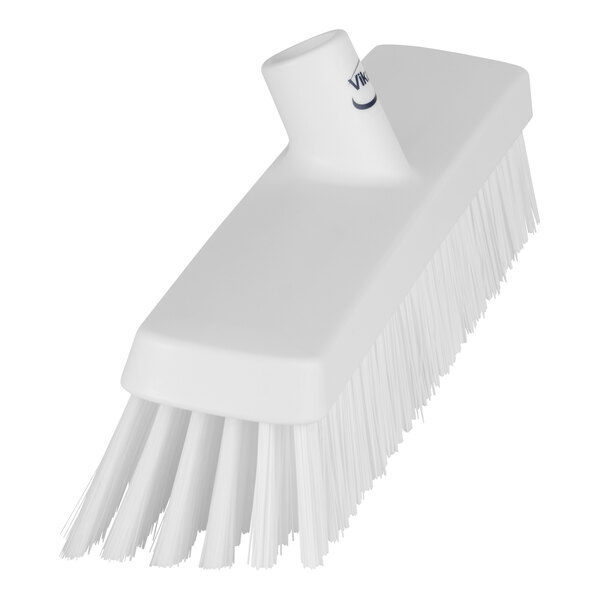 A Vikan white heavy-duty push broom head with soft / stiff bristles.