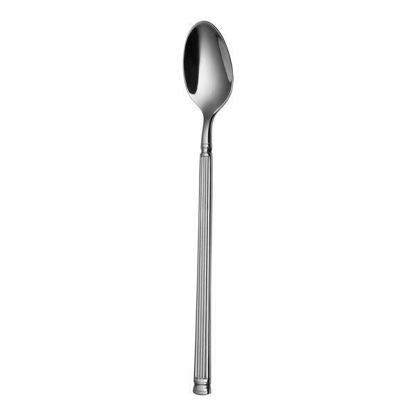 A close up of a Sola stainless steel iced tea spoon with a long handle.