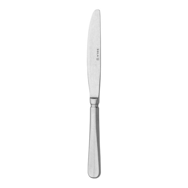 A Sola stainless steel dinner knife with a silver handle.