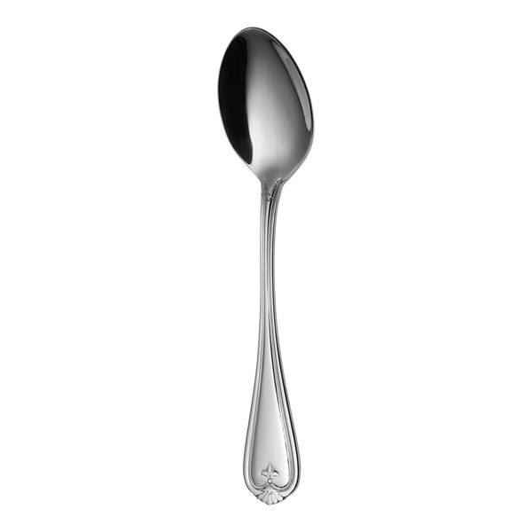 A Sola stainless steel demitasse spoon with a silver handle.