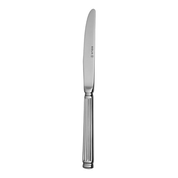 A Sola stainless steel dessert knife with a faceted handle.