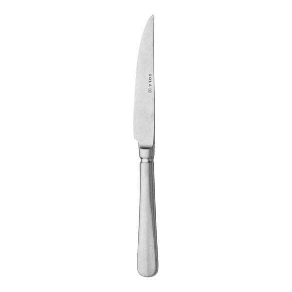 A Sola stainless steel steak knife with a silver handle.