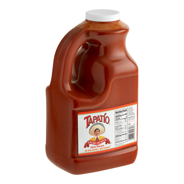 A jug of Tapatio Hot Sauce on a white background.