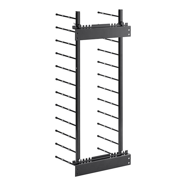 A black metal JackStack wall-mounted plate rack with black metal rods.