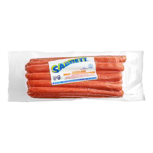 A package of Sabrett skinless beef hot dogs with a label.