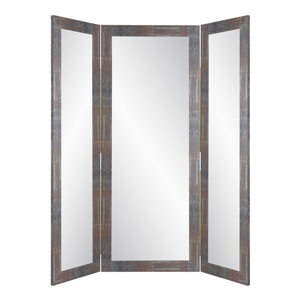 A BrandtWorks trifold dressing mirror with a wooden frame.