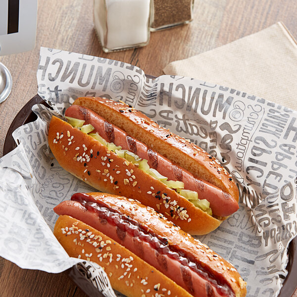 Two Sabrett natural casing beef hot dogs on a tray.