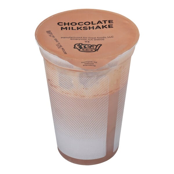 A f'real chocolate milkshake in a plastic cup with a lid.