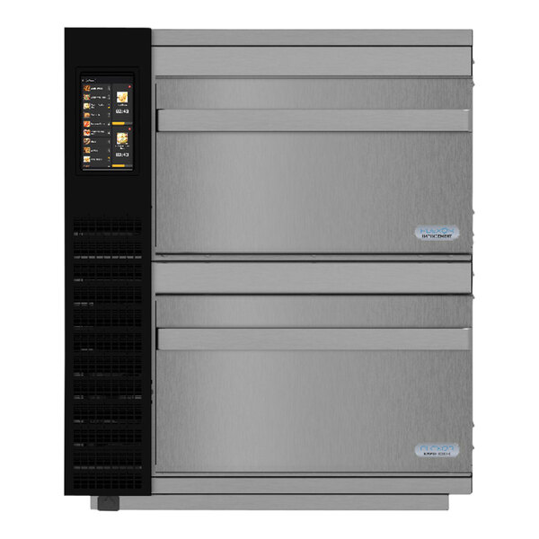 A stainless steel TurboChef Plexor M2 double oven with black rectangular panels with square holes.