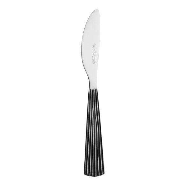 A silver Varick Briar butter knife with a black and white handle.