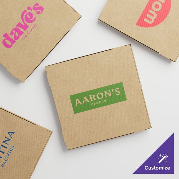 A group of Kraft cardboard pizza boxes with different logos.