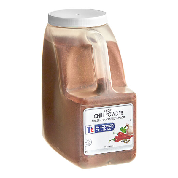 A plastic container of McCormick Culinary Choice Chili Powder.