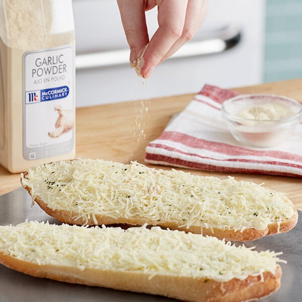 A package of McCormick Culinary Garlic Powder 21 oz. on a white background.