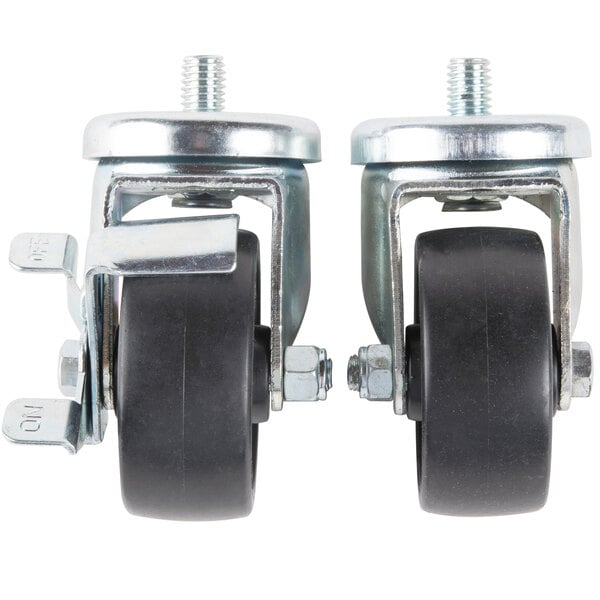 A pair of Traulsen stem casters with black rubber wheels and nuts.