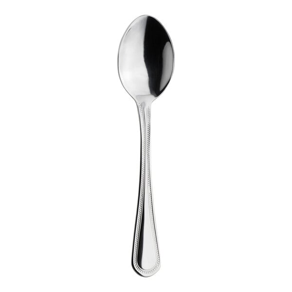 A Varick Elena stainless steel teaspoon with a black handle.