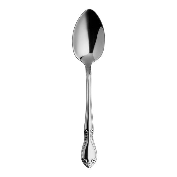 A Varick Flora stainless steel dessert spoon with a handle on a white background.