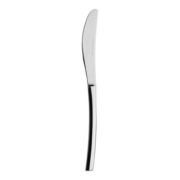 A Varick Origin stainless steel dinner knife with a black handle and silver blade.