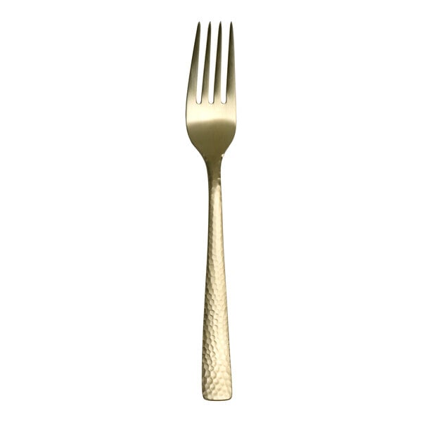 A close-up of a Varick Malcolm Champagne Gold stainless steel salad/dessert fork with a gold handle.