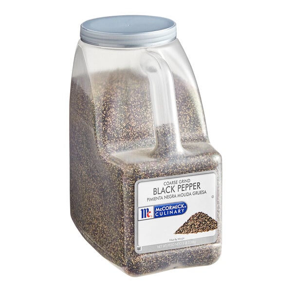 A white plastic container of McCormick Culinary Coarse Ground Black Pepper with a handle and a white label.