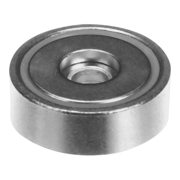 A nickel plated metal magnet with a hole in the middle.