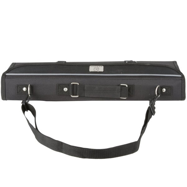 A black knife case with a silver buckle and straps.