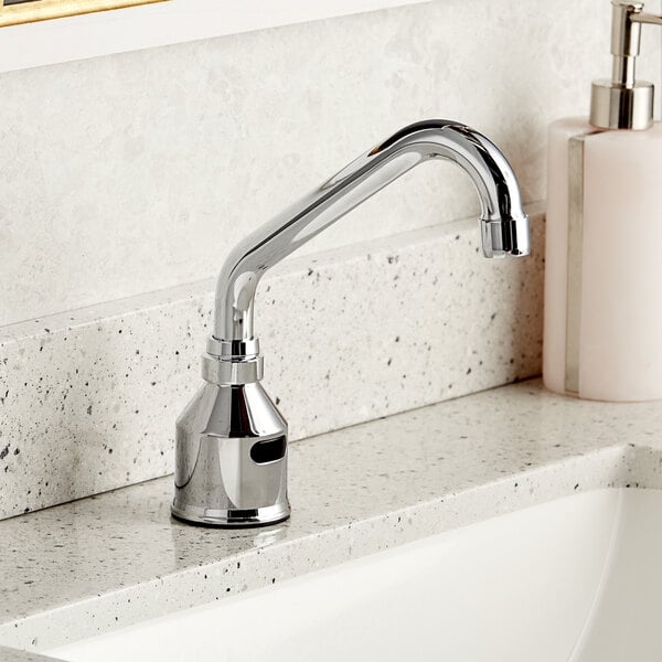 A Waterloo Deck-Mount medical faucet with a surgical bend gooseneck spout over a counter.