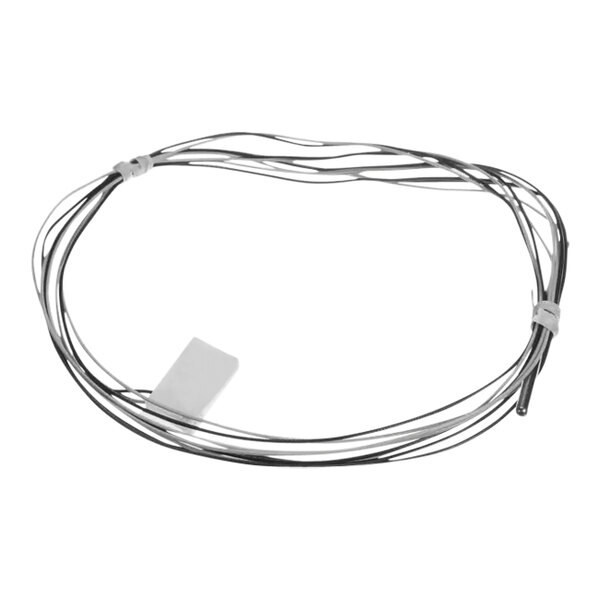 A wire with a white label attached to it.