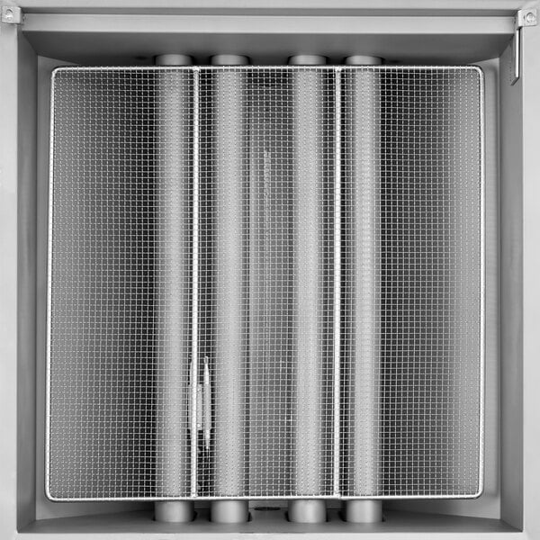 A close-up of the heater on an Avantco natural gas flat bottom fryer.