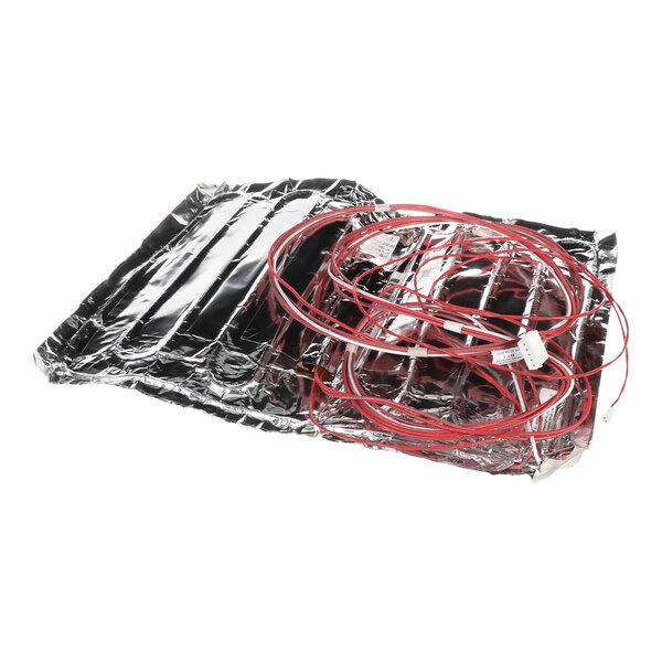 A plastic bag containing a foil heat pad with red and white wires.