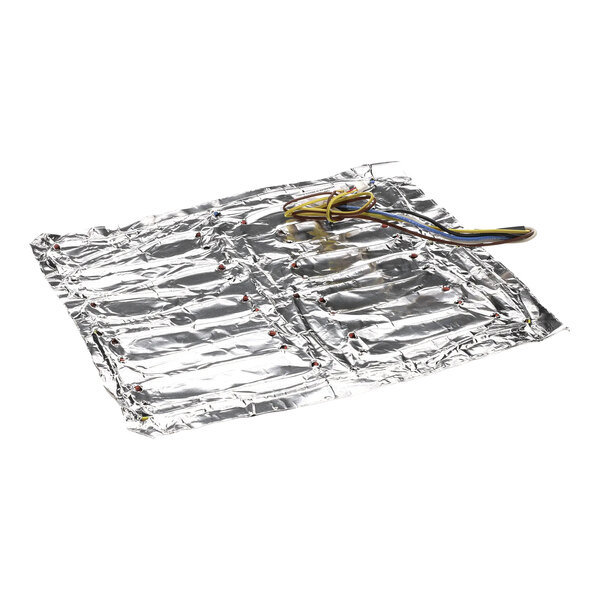 A close-up of a piece of aluminum foil with wires attached.