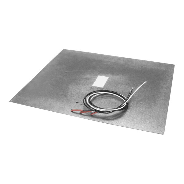 A metal plate with a wire attached to it.