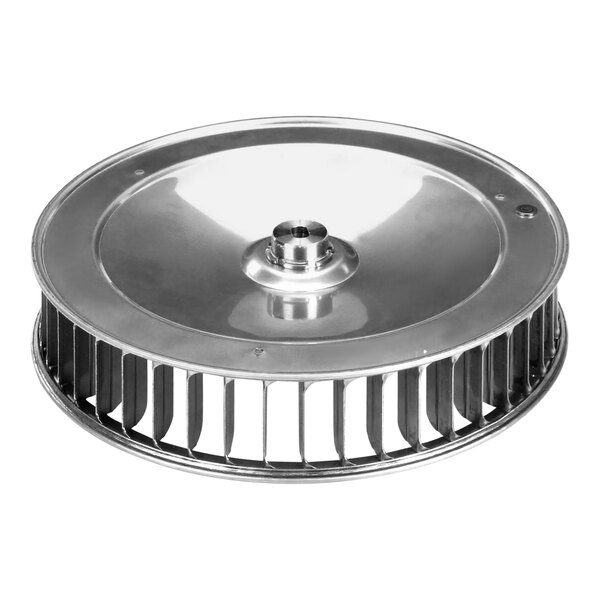 A silver metal fan with a circular metal plate and a round metal object with a hole.