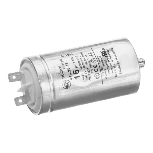 A silver metal capacitor with a white label.