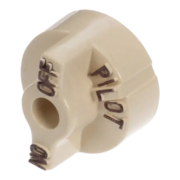 A white plastic Anets Unitrol dial with black text.