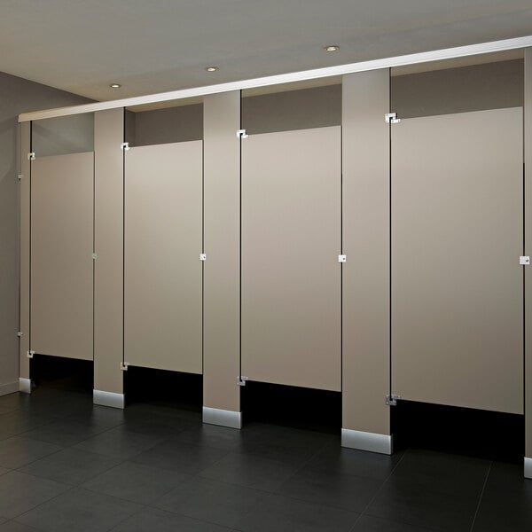 An ASI Accurate Partitions black core phenolic bathroom stall with four doors.
