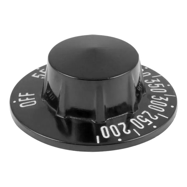 A black thermostat knob with white numbers.