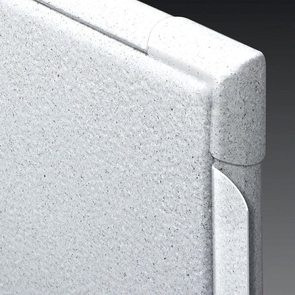 A close-up view of a powder-coated steel stall partition with integrated privacy features.