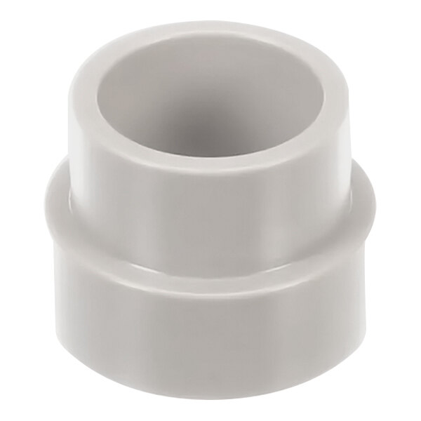 A white round plastic bushing with a hole.