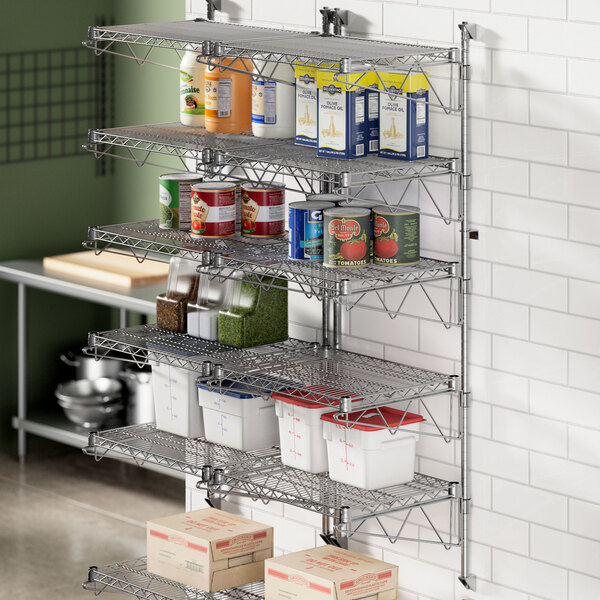A Regency stainless steel wall-mounted wire shelf with food items on it.
