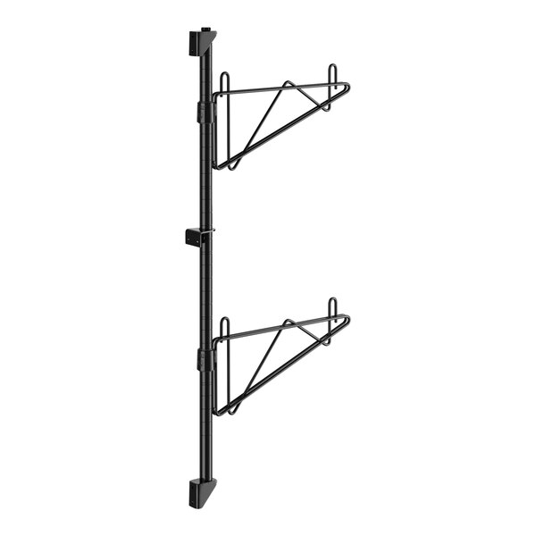 A black metal Regency wall-mount shelf post with single brackets and hooks on it.