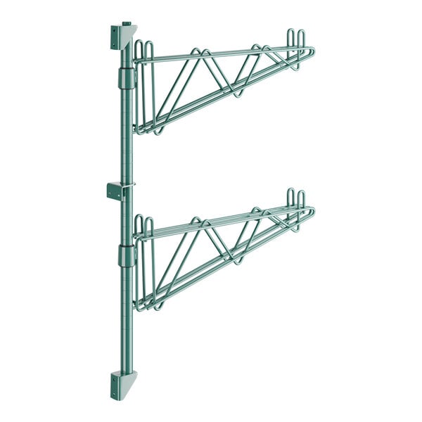 A green metal pole with two metal bars and three hooks.