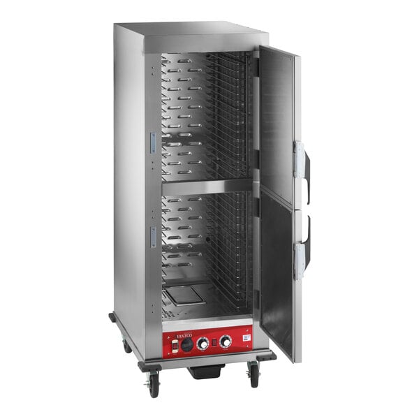 A full size insulated heated holding and proofing cabinet with solid stainless steel Dutch doors and multiple tray slots.