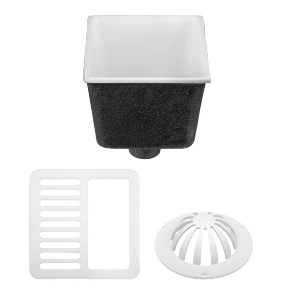A black and white Zurn floor sink with a square drain and cover.