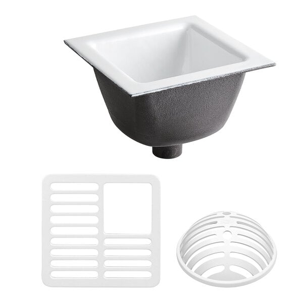 A white Zurn floor sink with a white drain cover.
